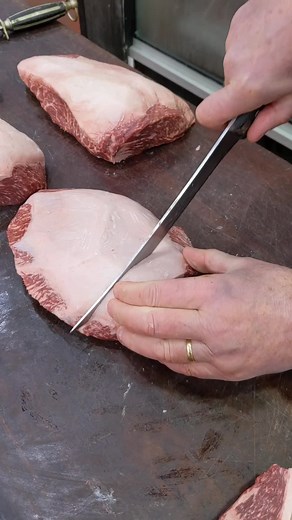Gary's showing off some serious butcher skills while whipping up a mouthwatering Wagyu Picanha! 🥩🔪 Picanha, also known as sirloin cap or coulotte steak, is a triangular cut of beef that's famous for its perfect balance of lean meat and a savory fat cap. When you bite into this steak, you're in for a flavor explosion like no other. #gmcbeanfamilybutcher #gmcbean #meat #steak