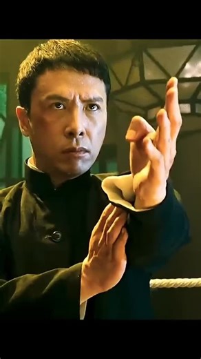 Ananda Kadam on Instagram: "lp Man vs the Western Boxer in lp Man 2 is one of the most defining East-vs-West clashes in modern martial arts cinema. Donnie Yen steps into this fight not just as a Wing Chun master, but as a symbol of Chinese martial culture being tested against raw Western power. This showdown wasn't shot as a “cool fight only" moment. The choreography highlights how Wing Chun's close-range chain punches centerline control, and footwork can neutralize a much bigger, heavier oppone