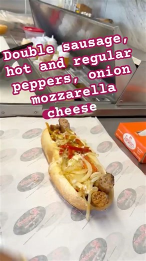 Making double, sausage, hot and regular mozzarella cheese, peppers, onions so tasty delicious 😋 ￼