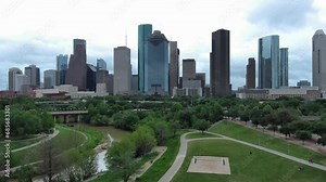 Houston. Downtown. High-rise buildings. Skyscrapers. Expressway. A park. Flight. Shooting from a drone