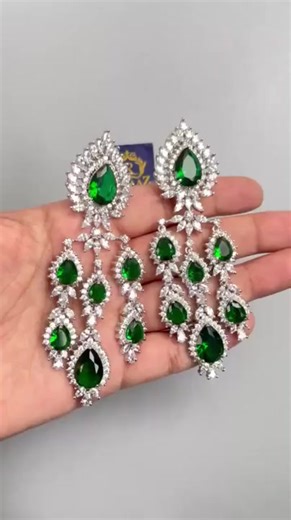 Gorgeous sparkly emerald green c diamond stones in rhodium plating Lightweight and elegant Length: Approx 3.7 inches Closure: Pushback Ready to ship from Maryland Free US standard shipping Please let me know if you have any questions