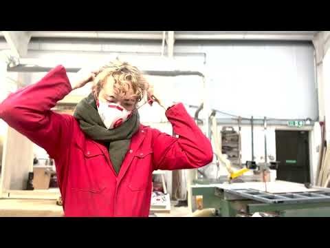 Installing a hinge using a handheld router