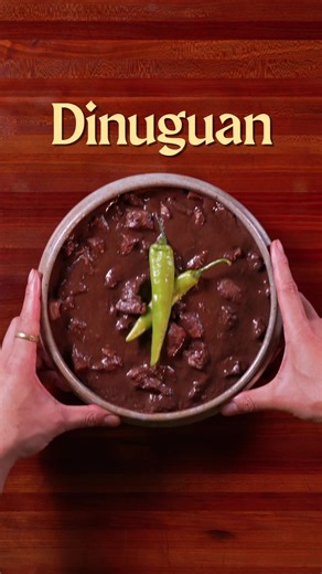 🇵🇭 Dinuguan w/ Puto (Pork blood stew) | Filipino Food Bible Ep. 8 Dinuguan is a savory stew simmered in a sauce of pork blood, vinegar, garlic, onions, and chilies. The blood gives it this deep, dark color and velvety texture, while vinegar adds a bit of brightness, balancing the overall richness. For our version we’re using pork belly and serving it alongside puto - a fluffy rice cake, which is how it's often enjoyed here in Manila. Note : Put the cheese in the puto halfway through the cook r