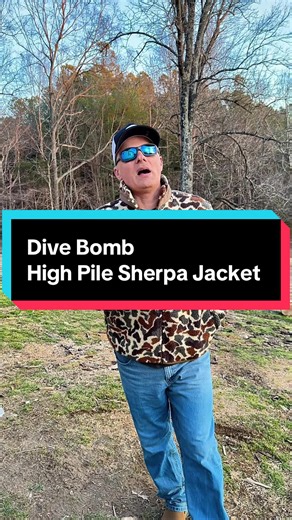 Dive Bomb High Pile Sherpa Jacket – Warm Camo Fleece Hunting Jacket for Cold Weather ⸻ Description: If you spend time outdoors in the cold, this Dive Bomb High Pile Sherpa Jacket is built for it. Heavy high-pile sherpa fleece locks in warmth while staying breathable, making it perfect for: ✔ Duck hunting ✔ Deer season ✔ Late fall farm work ✔ Cold mornings in the blind ✔ Everyday winter wear Features: • Ultra-warm high pile sherpa fleece • Full zip front • Durable chest pocket for gear • Camo pat