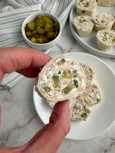 Dill pickle pinwheels - Recipe in comments #dillpicklepinwheels #dillpickles #pinwheels #easyappetizers | Foodlovinfamily
