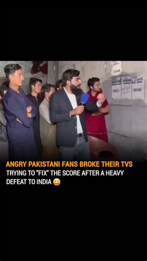 National Buzz Official on Instagram: "A hilarious video is taking the world by storm after India's sweeping win over Pakistan! The viral clip shows frustrated Pakistani fans literally smashing their TVs to "fix" the scoreboard. After frantically clicking their remotes failed to rewrite reality, supporters blamed their screens instead of the team's performance. Eyewitnesses joked that local repair shops saw a massive late-night boom as heartbroken fans tried to give the match a physical "hard res