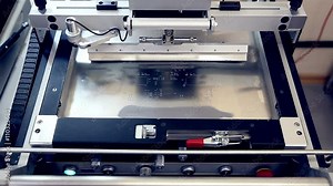 Surface Mount Technology Machine Places Elements On Circuit Boards. HD.