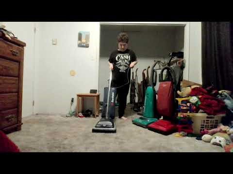 vacuuming the bedroom with 2008 sanitaire s647 type e