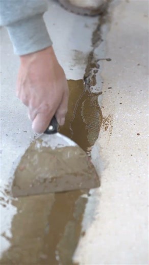 Patching and grinding this garage floor before installing our flake system.