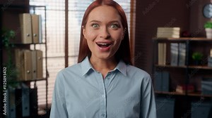 Caucasian excited amazed wonder surprised businesswoman girl lady female business woman in office indoors company work open mouth big eyes good news say wow winning achieve amazing wondering emotion