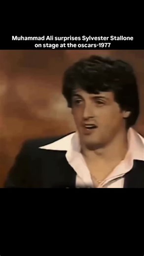 MotionByteX on Instagram: "At the 49th Academy Awards in 1977, an unforgettable and spontaneous moment stole the spotlight from the usual Hollywood glitz. Sylvester Stallone then a rising star nominated for Rocky was onstage presenting when Muhammad Ali, the reigning boxing legend, suddenly appeared behind him, igniting gasps and laughter across the audience. Ali playfully challenged Stallone in front of millions, teasing that he was the “real Apollo Creed,” the charismatic boxer that inspired R