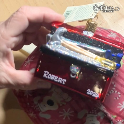 Take a peek behind the scenes! Here is Leda, one of our personalizers, skillfully personalizing on a glass ornament with a white paint marker. It takes years of practice to reach this level of precision and mastery! 😮 - - #callisterschristmas #christmasshop #christmasornaments #christmasdecorideas #christmastreedecorating #christmastreedecorations #christmasdecorations #xmasdecorations #christmas2025 #shoplocalwisconsin #oldworldchristmas #glassornaments #personalizedornaments | Callisters Chri