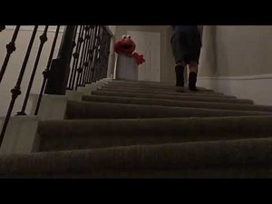 Elmo falls down the steps