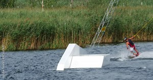 Wakeboard trick on a slider in 4k.