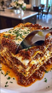 Classic Meat Lasagna with Rich Bolognese & Creamy Cheese Layers Lasagna is one of those dishes that feels like an event—even when you’re just making it for a regular dinner. It’s cozy in the best way: Ingredients: For the Meat Sauce (Bolognese): 1 tablespoon olive oil 1 small onion, finely chopped 2 cloves garlic, minced Full Recipe in Coʍmеոτ | Stir of Comfort