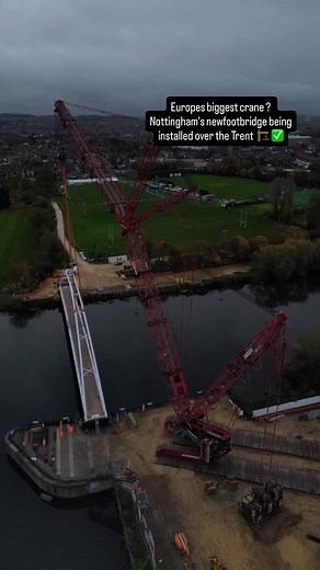A new connection over the River Trent 🏗️ 👷🏻‍♂️ The new footbridge linking Colwick and West Bridgford lifted into place today — installed with one of Europe’s largest Terex cranes operated by Mammoet. Engineering at scale. #Nottingham #RiverTrent #WestBridgford #Colwick #Footbridge #BridgeInstallation #Mammoet #Terex #HeavyLift #CranesOfInstagram #Engineering #CivilEngineering #Infrastructure #ConstructionUK #DroneFootage #DroneVideo #BridgeBuild #UKConstruction | JD Outdoor Property Managemen