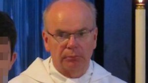 Perv priest who put hand down sleeping man's pants on train caged