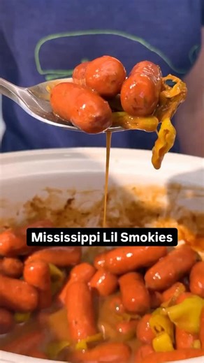 Get ready for these lil’ guys to disappear off the table. 🧡 These Crockpot Mississippi Cocktail Smokies are rich and savory with a tangy, buttery sauce that clings to each bite! 🙌 Keep reading or get the full recipe in the @allrecipes bio. ⬆️ Ingredients: 2 (14 ounce) packages cocktail-size smoked sausages 1 tablespoon Worcestershire sauce 1 cup sliced pepperoncini salad peppers, divided 1/4 cup liquid from pepperoncini jar 1 (1 ounce) envelope au jus gravy mix 1 (1 ounce) envelope ranch seaso
