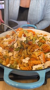 Easy one pan pasta dinner (with vegetable and chicken) Olivia uses oil, tomatoes, carrots, snap peas, minced garlic, garlic powder, onion powder, pepper, salt, red chili flakes, pasta, chicken bone broth, rotisserie chicken, lemon and butter to make a yummy dish. This original video was produced by Network Media LLC and Olivia | Jacky and Olivia’s Kitchen
