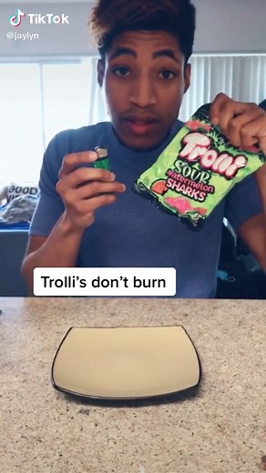 Trolli’s don’t burn 😱 #experiment #jellycandy #trollis#reaction #tasty #boredathome #fyp #foryou
