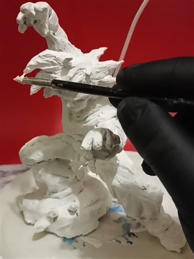 Applying modeling paste for details and repairing #sculpture #goku #dragonball