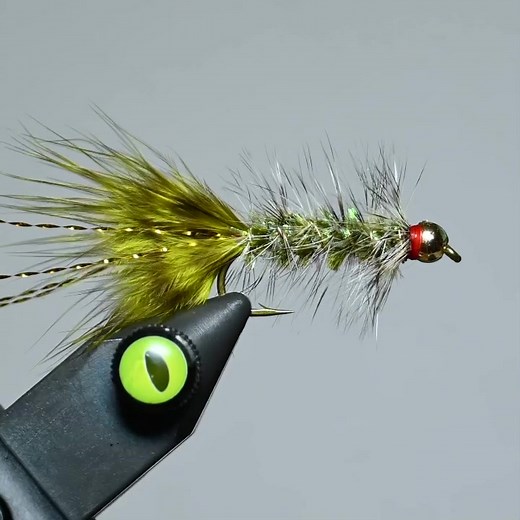 The Woolly Bugger in olive. #flytying #trout #makeyourown
