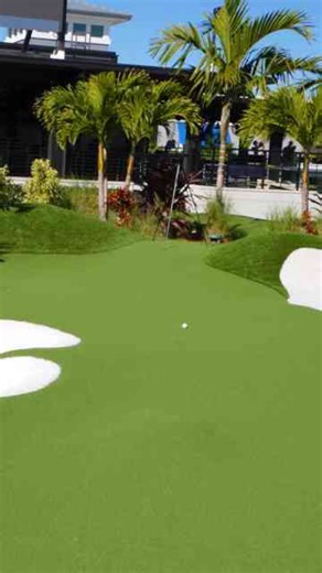 Playing a mini golf hole designed by Tiger Woods