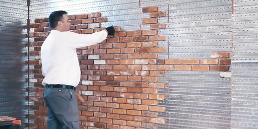 This thin brick wall is cheaper and quicker to install than the real thing