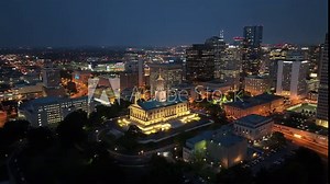 Tennessee State Capitol building at night in Nashville, Tennessee with drone video moving at an angle wide shot.