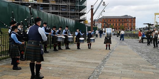 Down Academy Pipes & Drums under PM William Wallace perform close to the SS Nomadic at Belfast TradFest - the band were a credit to themselves and to all their supporters | We Love Pipe Bands