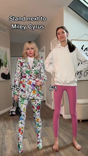 How tall are you next to Miley Cyrus #viral #trending #mileycyrus #tall #flowers #reels | That Tall Family