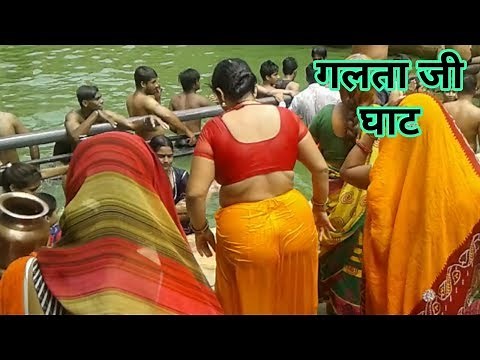 Open Bath. Ladies bathing in Galta ji Ghat. Monkey Temple, Galta ji Ghat, Jaipur rajasthan India.