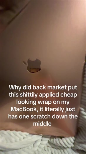 It looks so much better without it even with the scratch | back market