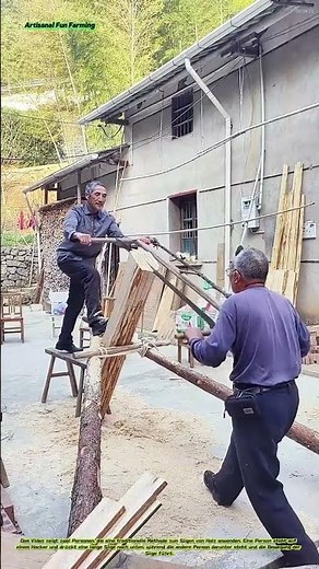 Traditional wood sawing technique in action