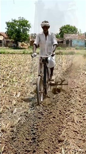 A farmer made a farm tilling machine from his old bicycle 🚲🌾 #farmerinnovation #cyclemachine