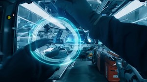 Download A mechanic in a high-tech garage working on a car engine, using advanced diagnostic tools. for free