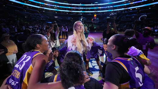 Magic Johnson celebrates the return of Sparks' Cameron Brink