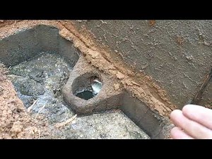 A septic tank inlet baffle and don't put concrete over your tank