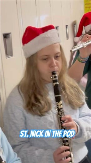 8th Graders Caroling in the 6th Grade Pod