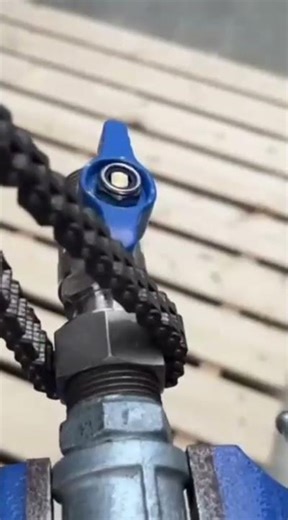 This is one way to remove a thread on a tap using a chain as an aid.