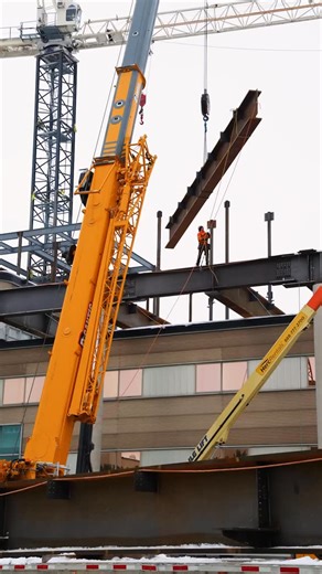 6.8K views · 3 comments | Yesterday was a big day on the M4 construction front! Large steel beams weighing 26,000 - 36,000lbs were installed! These beams required a special crane that weighed 140 tons! These beams are integral in bearing the load and distributing the weight of the new floors that will be above the DC office wing. | Waterloo Math | Facebook