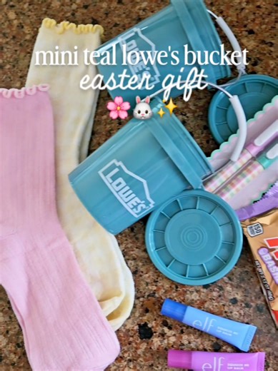 mini teal lowe's bucket easter gift idea🐰🥕✨️🌸 this is my new favorite color and you know I had to recreate my most viral reel/gift idea ever!😍 Grab for a great teacher gift, bestie gift, or anyone! Literally the cutest $2 buckets and they are going to sell out so snag quick! 🌸🐰 Follow and comment NEED for the links & free printable! Xoxo, Ash #Easter #lowesfinds #loweshomeimprovement #lowesminibucket @Lowe’s #lowespartner