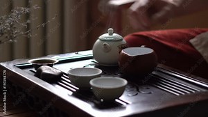 Pouring of Green Tea in Traditional Chinese Tea Ceremony. Set of Equipment for Drinking Tea