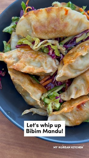 Bibim Mandu Recipe: A vibrant Korean potsticker salad that's sweet, spicy, and delightfully crunchy. Discover how easy it is to transform those frozen dumplings sitting in your freezer into a show-stopping dish perfect for any occasion. #mandu #koreandumplings | My Korean Kitchen