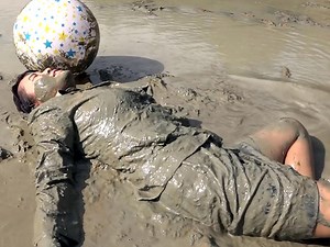 Physical training covered with mud