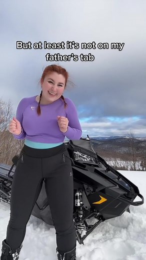 Teal Snowmobile - Outdoor Adventure with the Best Sled