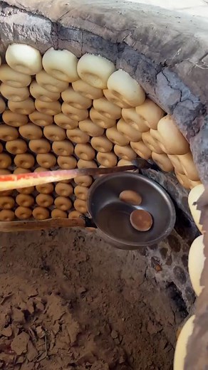 Traditional Bread-Making Process in Rustic Oven