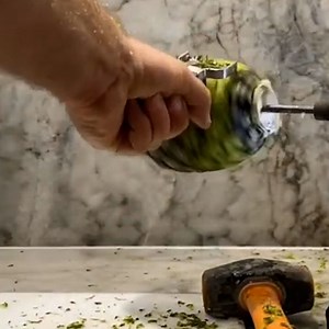 Watch this pineapple get peeled by a power drill