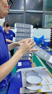 Busy production line, surface mounted frameless panel light packaging workshop. | KEOU LED Light Factory