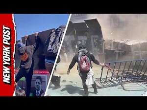 Protesters rip down palace barriers in Mexico City clash with police